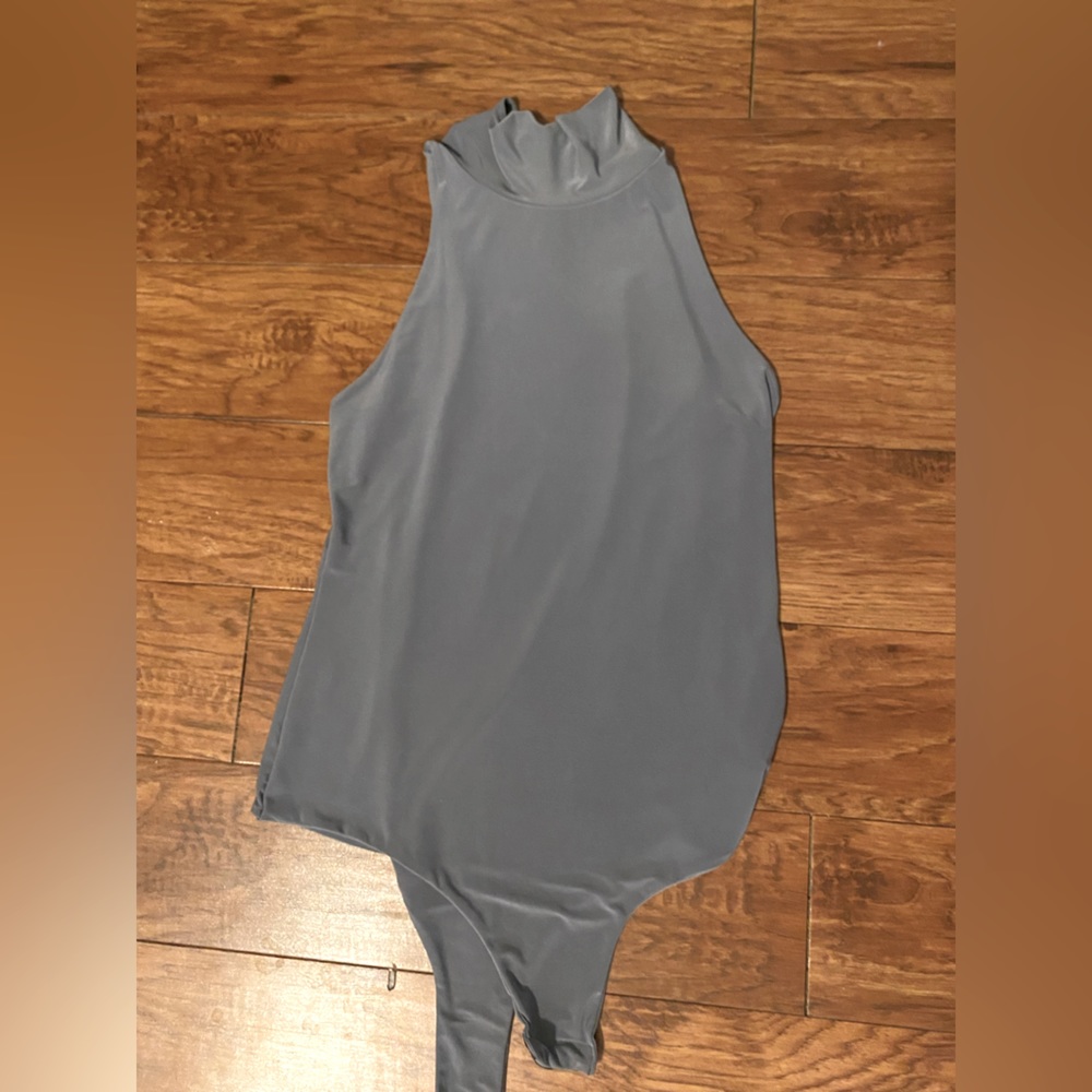 Grey turtle neck body suit. Size 8 US